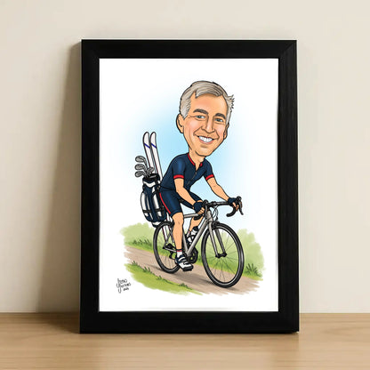 A framed caricature art print of a man riding a bicycle with golf clubs on the back, displayed on a wooden surface against a beige wall.