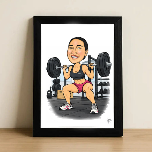 A framed caricature art print showing a woman in a gym squatting a barbell. The print is framed in a black frame and displayed against a neutral beige wall on a light wood surface.